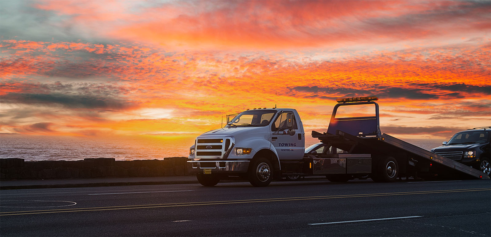 MKi-Wheels-mobile-inset-sunset-shot-1 Specialized Insurance for Towing Companies